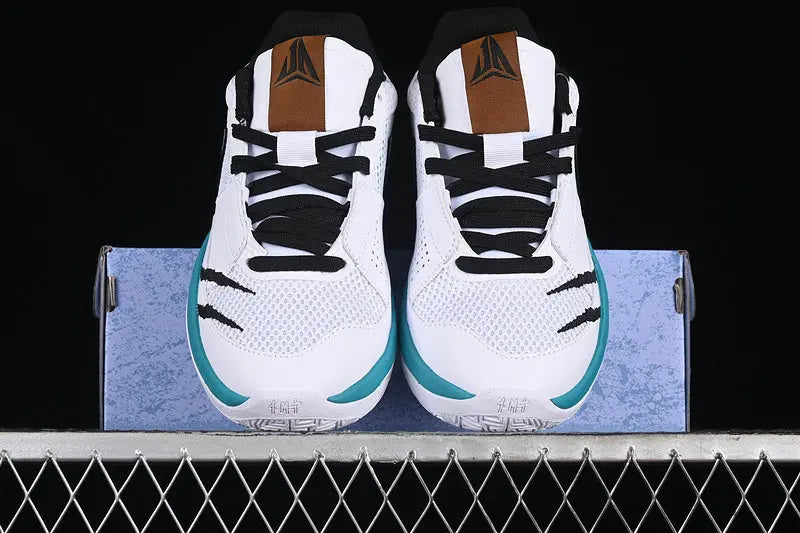 nike ja 1 x reverse scratch basketball shoes side view with bold inverted scratch colorway