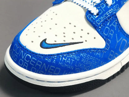 Nike Dunk Low “Jackie Robinson” sneaker with black, grey, and royal blue accents honoring the baseball legend
