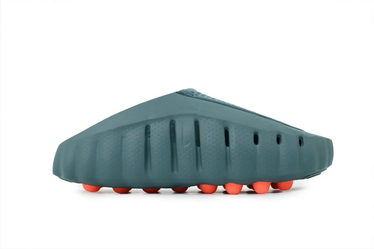 Side view of Nike Mind 001 Slide Mineral Slate showing the thick ultra-soft foam footbed and minimalist design
