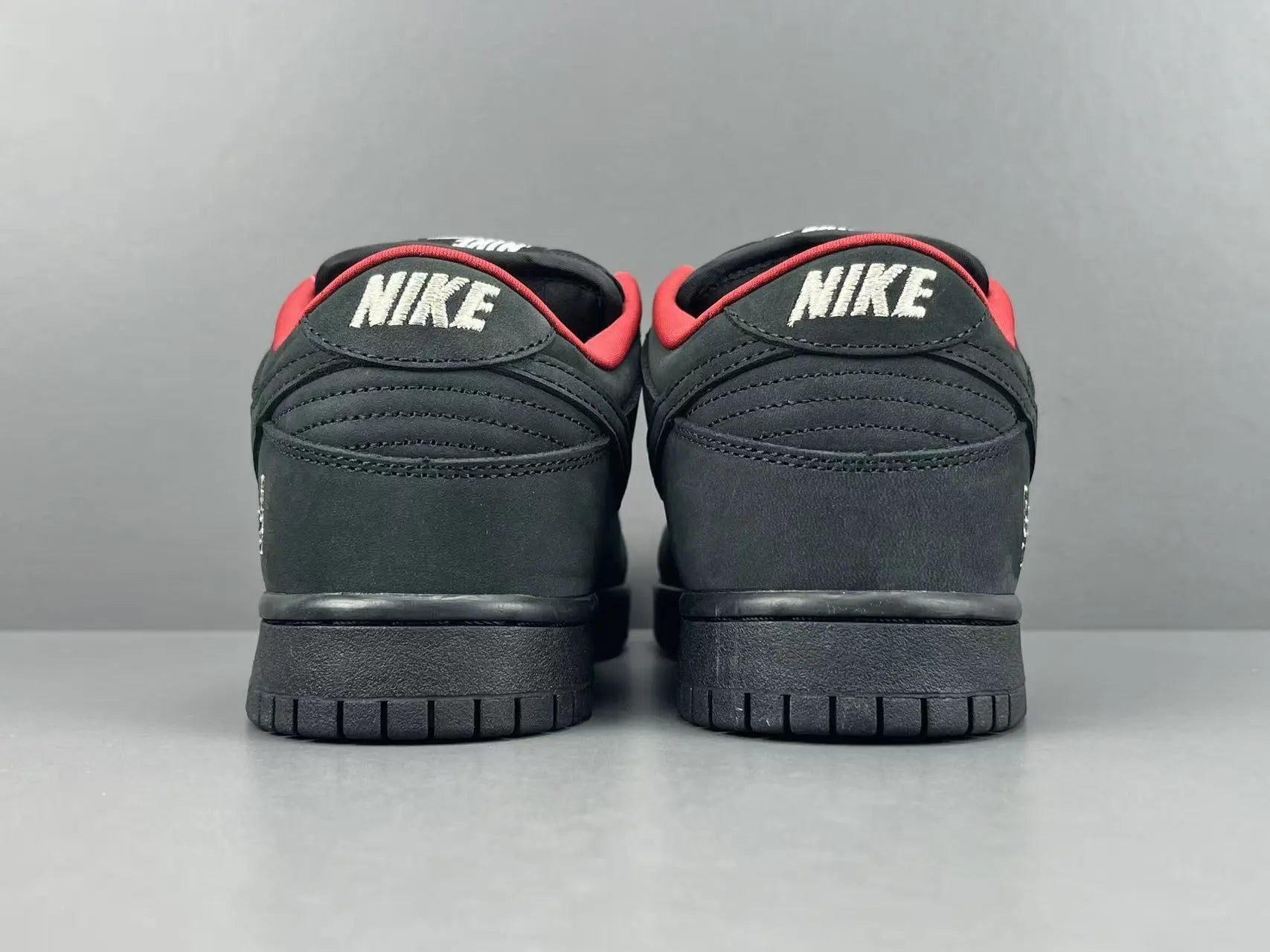 Nike SB Dunk Supreme 94 Black low top sneaker side view all black