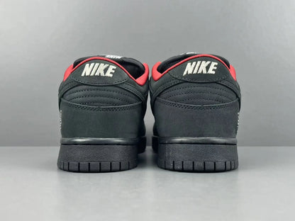 Nike SB Dunk Supreme 94 Black low top sneaker side view all black