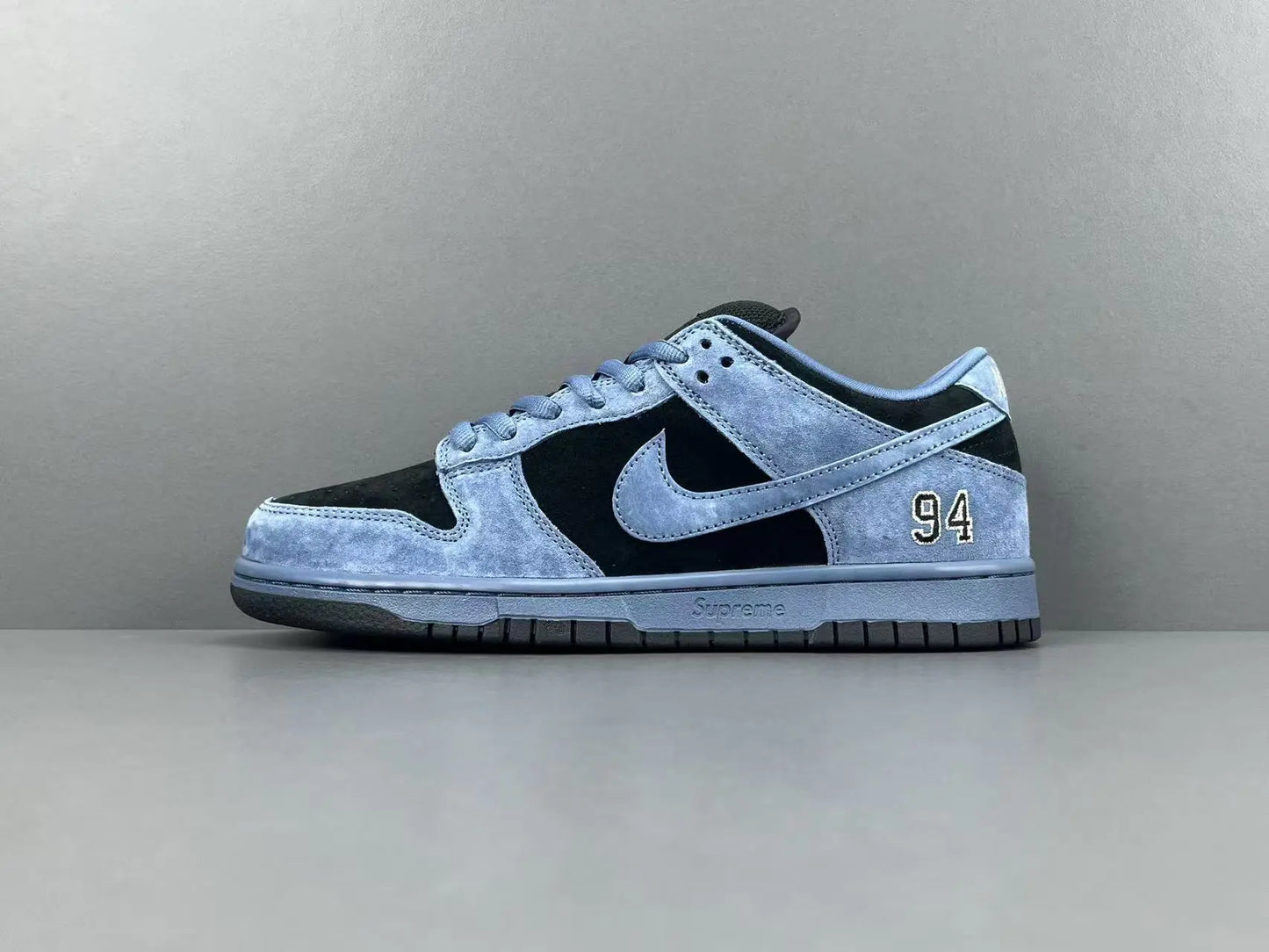 Nike SB Dunk Supreme 94 Ocean Fog low top sneaker side view grey white