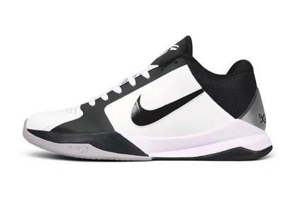 Nike Kobe 5 Protro White/Black low-top basketball sneakers featuring a clean white upper with contrasting black overlays, Swoosh branding, and heel details – performance basketball shoe with Zoom Turbo cushioning