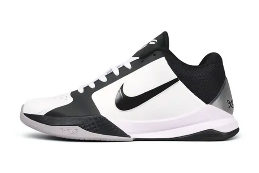 Nike Kobe 5 Protro White/Black low-top basketball sneakers featuring a clean white upper with contrasting black overlays, Swoosh branding, and heel details – performance basketball shoe with Zoom Turbo cushioning
