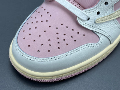 Jordan 1 Low x Travis Scott Shy Pink sneakers with reversed Swoosh design