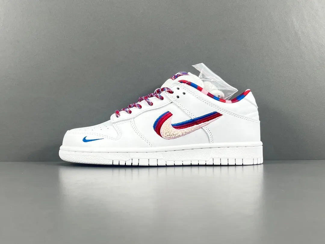 Nike SB Dunk Low Parra white sneaker with pink blue green abstract overlays limited edition skate shoe