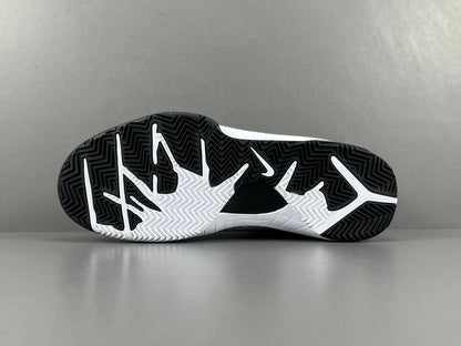 Nike Kobe 4 Protro White Black Del Sol basketball sneakers with accents
