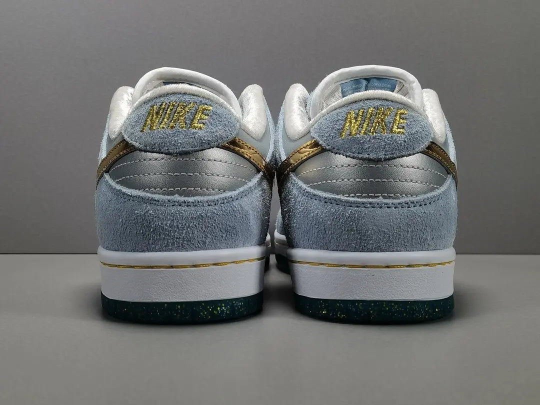 Nike SB Dunk Low Sean Cliver white gold sneaker holiday special edition red velvet lining skate shoe