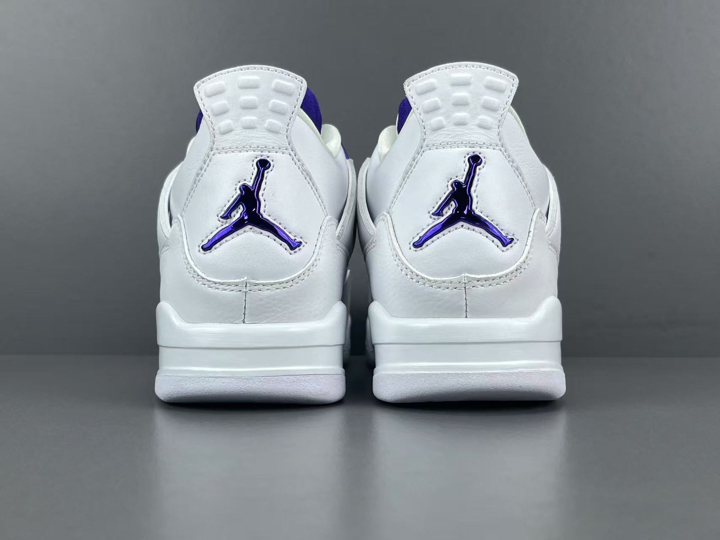 Air Jordan 4 Metallic Purple clean white sneakers with metallic purple details