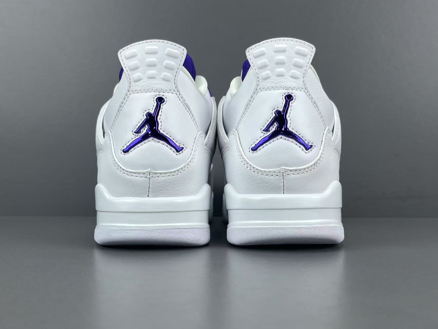 Air Jordan 4 Metallic Purple clean white sneakers with metallic purple details