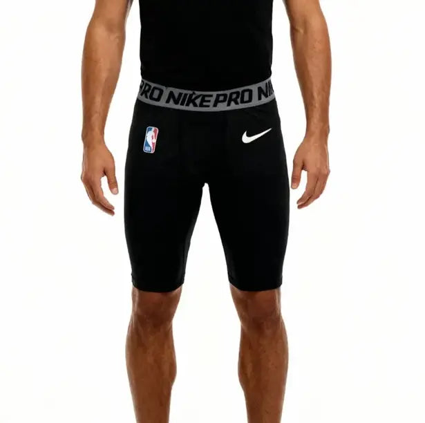 Black athletic shorts with Nike and NBA logos on a white background
