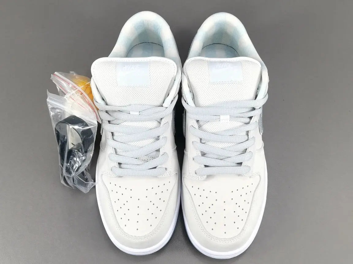 Nike SB Dunk White Lobster Friends and Family low top sneaker side view white grey