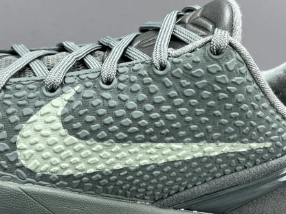 “Black and purple Nike Kobe 6 Protro sneakers with ‘Fade to Black’ design.”

