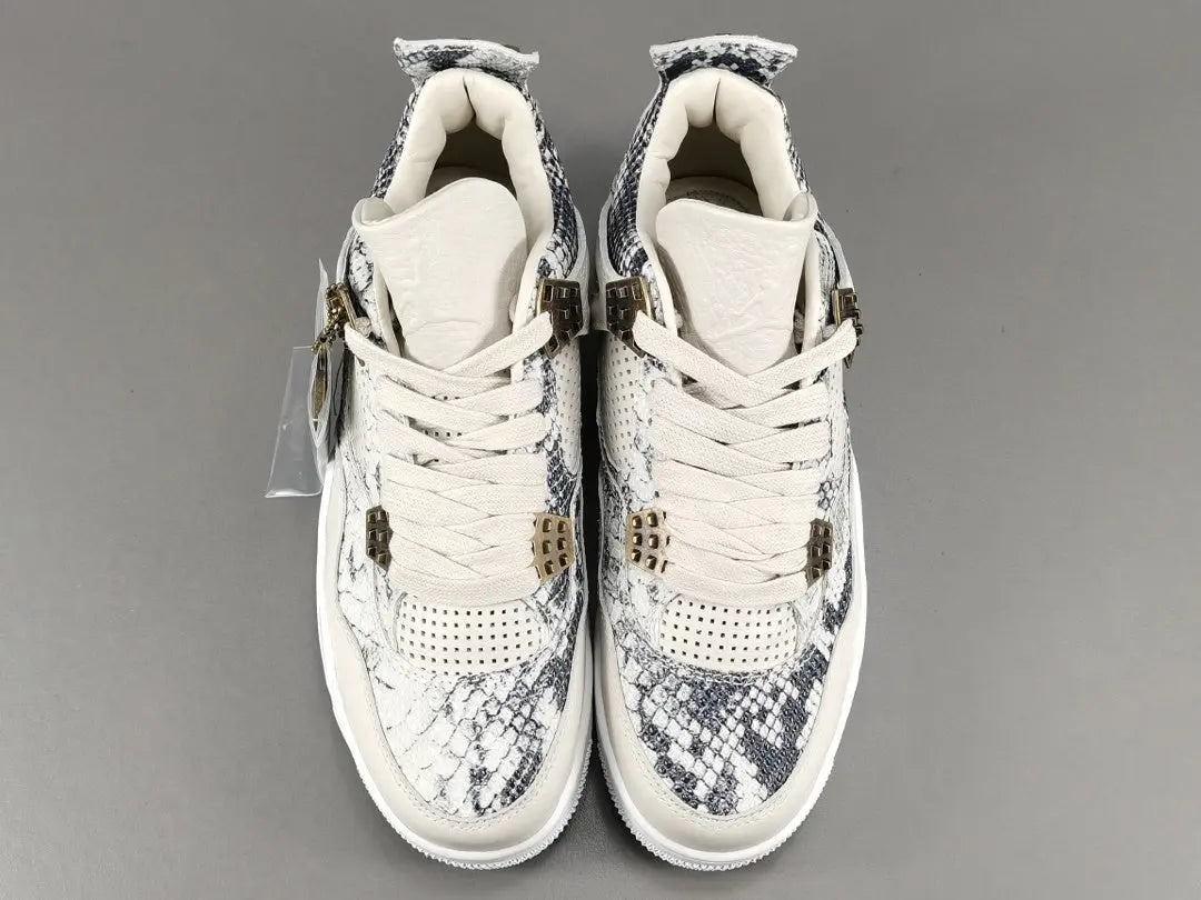 Air Jordan 4 Snakeskin sneakers side view luxury textured retro basketball shoes