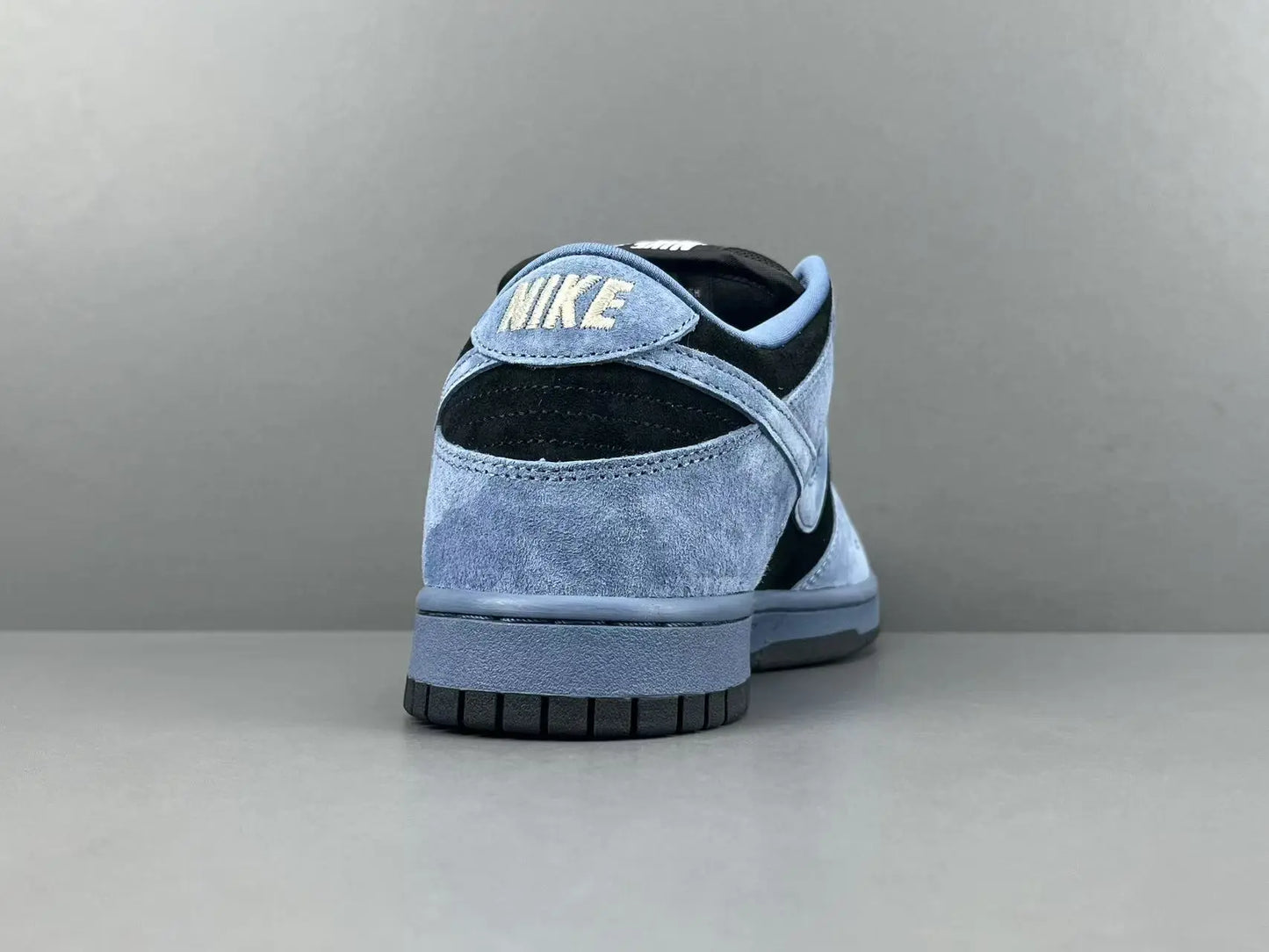 Nike SB Dunk Supreme 94 Ocean Fog low top sneaker side view grey white