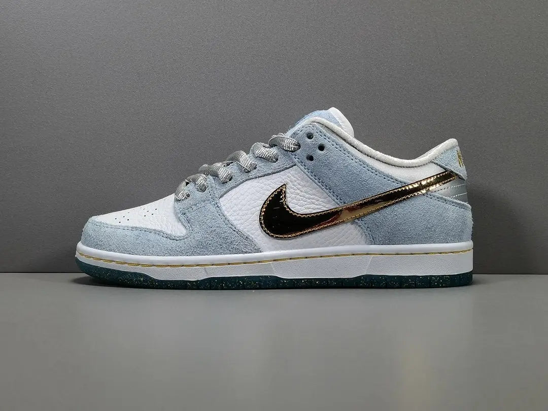 Nike SB Dunk Low Sean Cliver white gold sneaker holiday special edition red velvet lining skate shoe