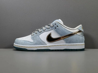 Nike SB Dunk Low Sean Cliver white gold sneaker holiday special edition red velvet lining skate shoe