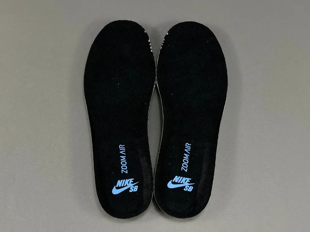 Nike SB Dunk Low Black University Blue sneaker premium leather suede limited edition skateboarding streetwear shoe