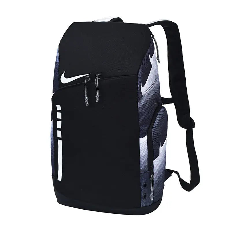 A Nike backpack in black with white and gray patterned side panels, featuring a white Nike swoosh on the front, dual zipper pulls, and padded shoulder straps, shown against a plain white background.