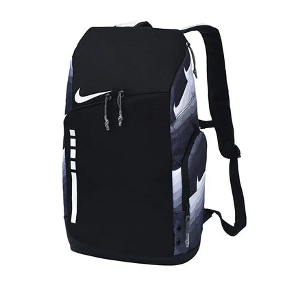 A Nike backpack in black with white and gray patterned side panels, featuring a white Nike swoosh on the front, dual zipper pulls, and padded shoulder straps, shown against a plain white background.