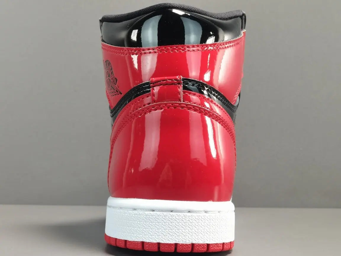 Jordan 1 Retro High Patent Bred black red patent leather sneaker
