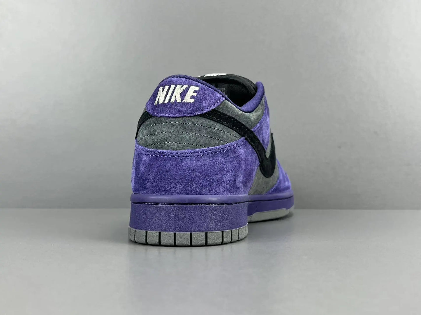 Nike SB Dunk Low x Supreme 94 Ink sneaker in deep blue leather
