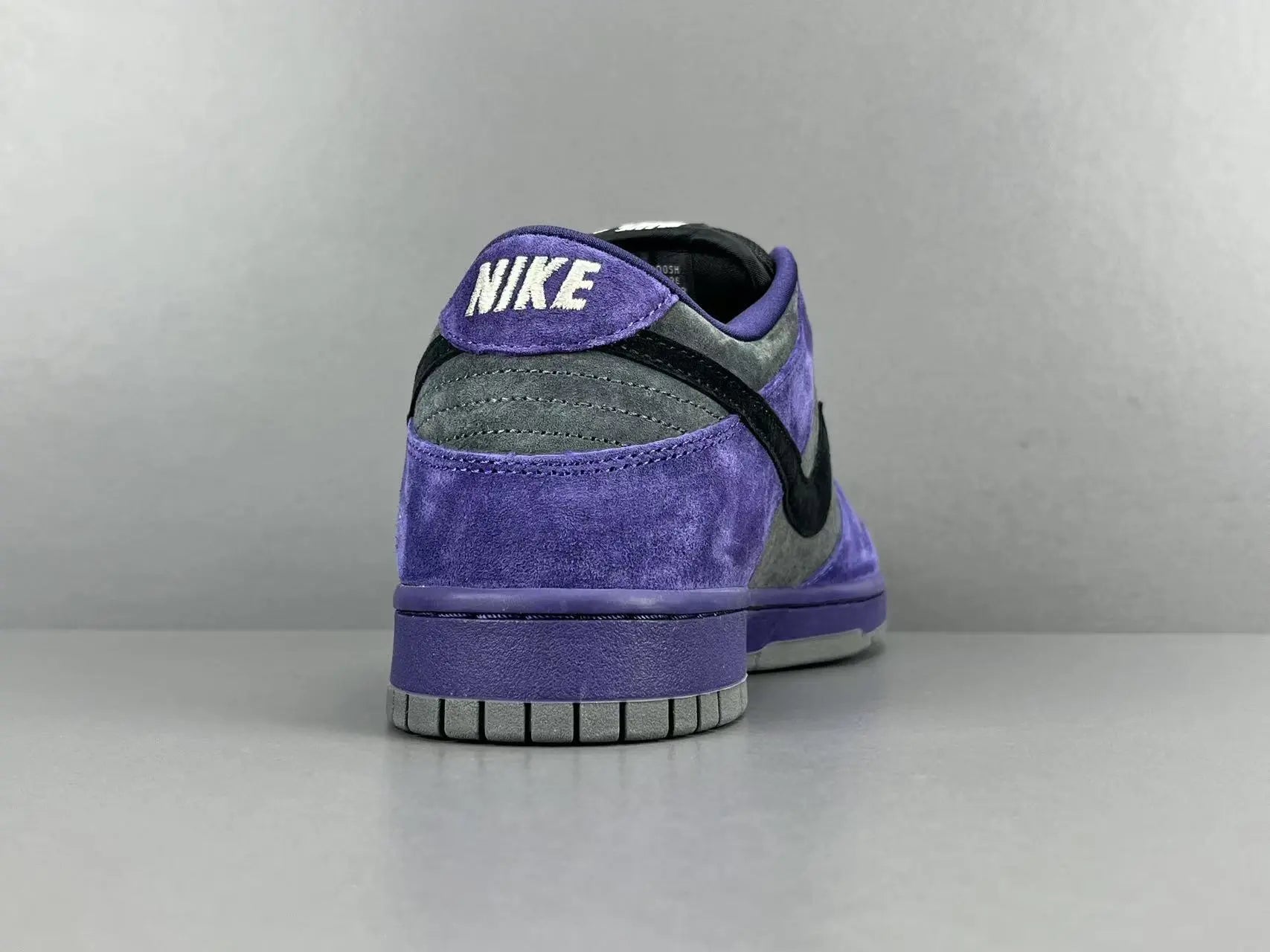 Nike SB Dunk Low x Supreme 94 Ink sneaker in deep blue leather

