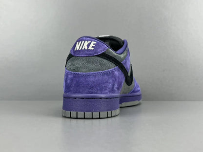 Nike SB Dunk Low x Supreme 94 Ink sneaker in deep blue leather
