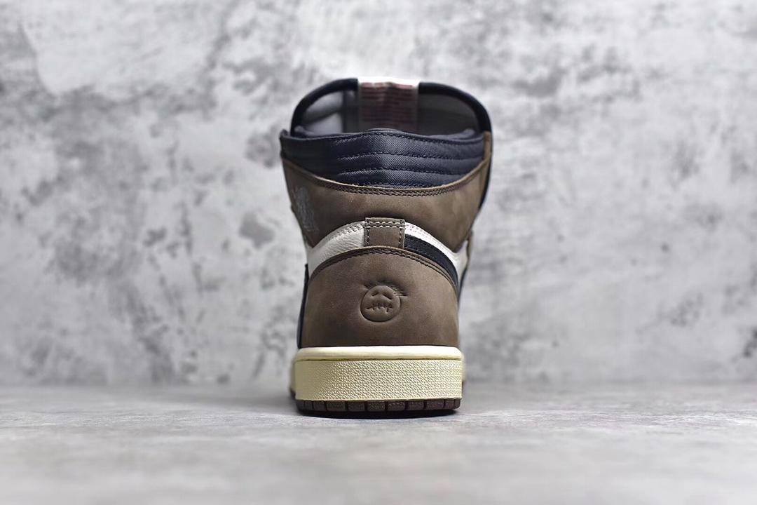 Jordan 1 High Travis Scott sneakers featuring iconic reverse Swoosh and premium design