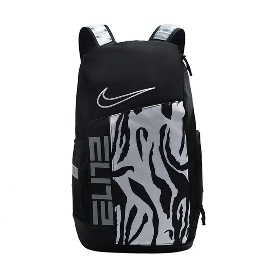 A black Nike backpack with a large white and gray zebra-stripe pattern on the front pocket, featuring a white Nike swoosh and vertical 'ELITE' text.