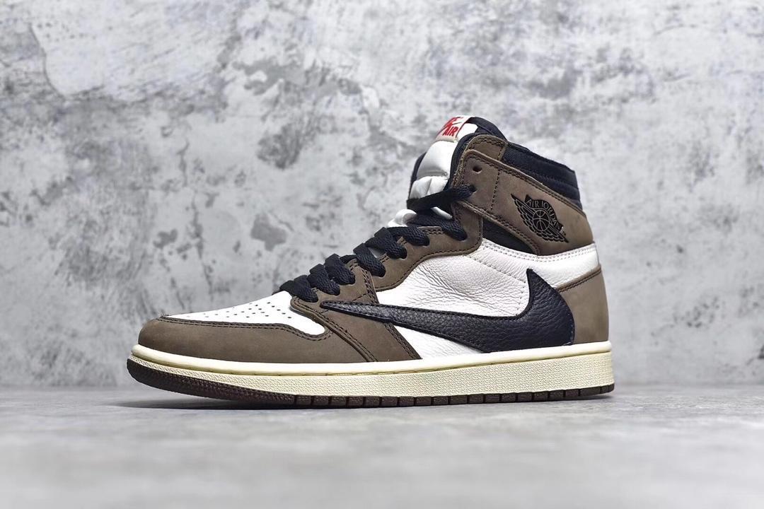 Jordan 1 High Travis Scott sneakers featuring iconic reverse Swoosh and premium design