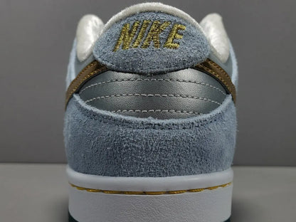 Nike SB Dunk Low Sean Cliver white gold sneaker holiday special edition red velvet lining skate shoe