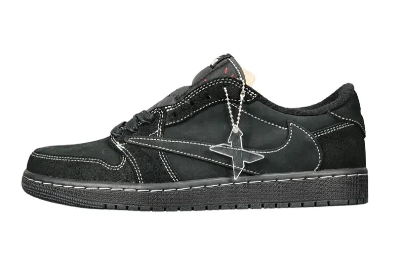 "Jordan 1 Low Travis Scott Phantom with black nubuck, white stitching, and signature reverse Swoosh."