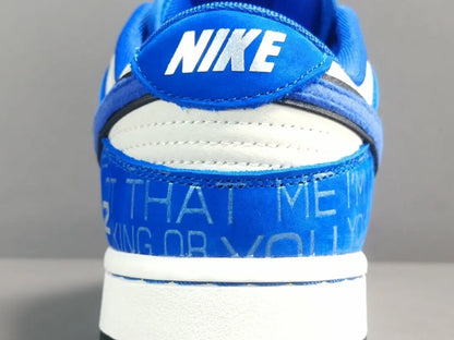 Nike Dunk Low “Jackie Robinson” sneaker with black, grey, and royal blue accents honoring the baseball legend
