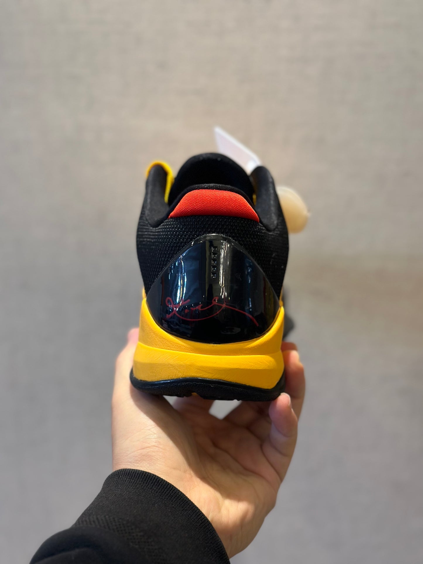 Nike Kobe 5 Protro Bruce Lee basketball shoes in yellow and black colorway
