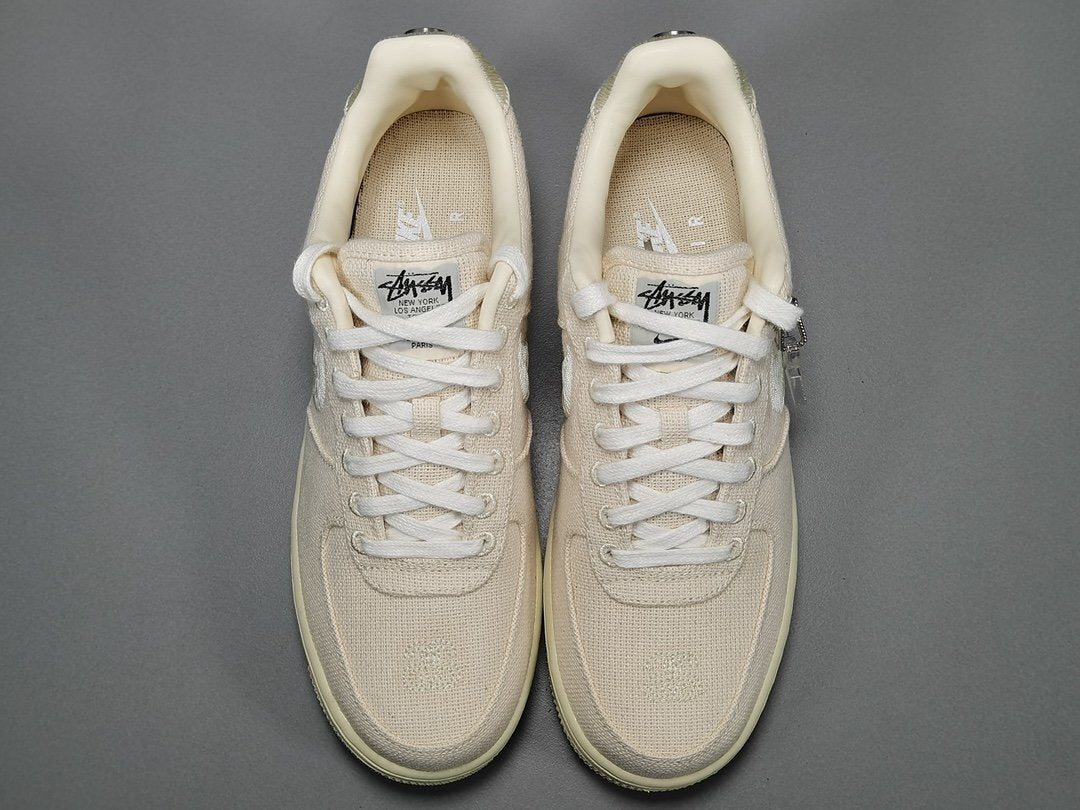 Nike Air Force 1 x Stüssy Fossil featuring textured hemp upper and minimalist branding
