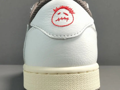 "Jordan 1 Low x Travis Scott Reverse Mocha – Mocha suede, reverse Swoosh, Cactus Jack branding, and vintage sail accents."