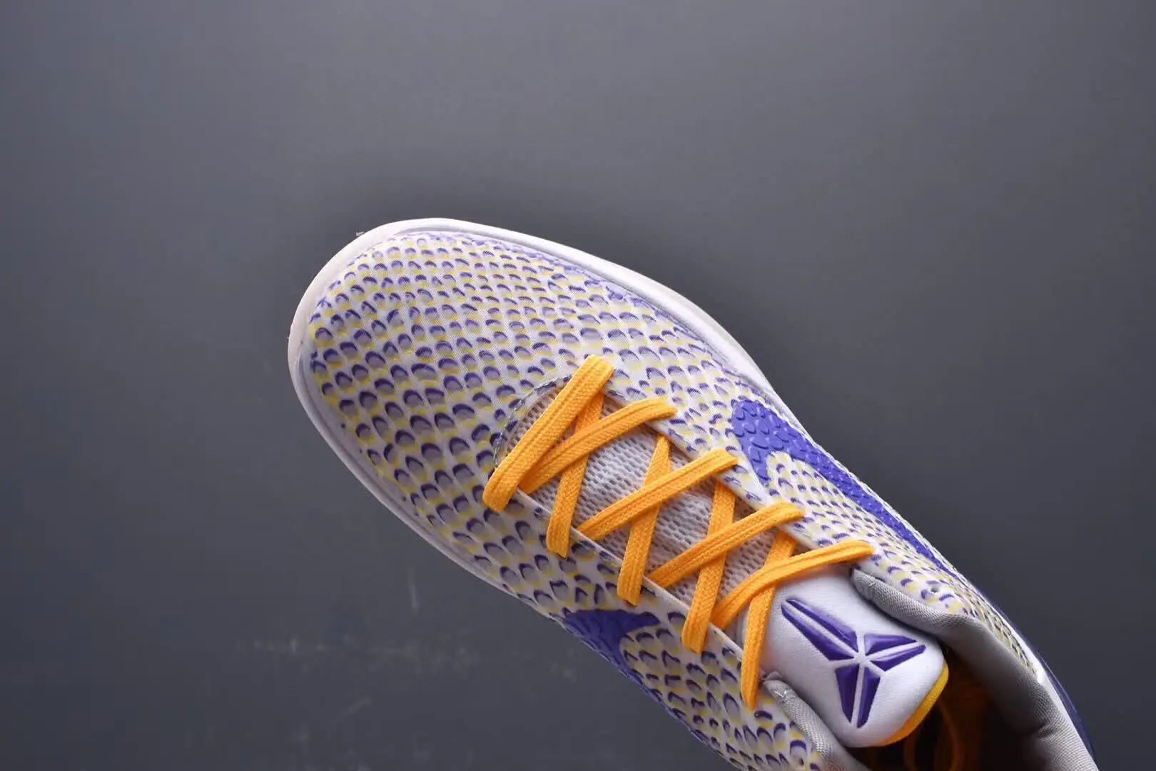 Purple and gold Kobe 6 sneakers with 3D Lakers logo design