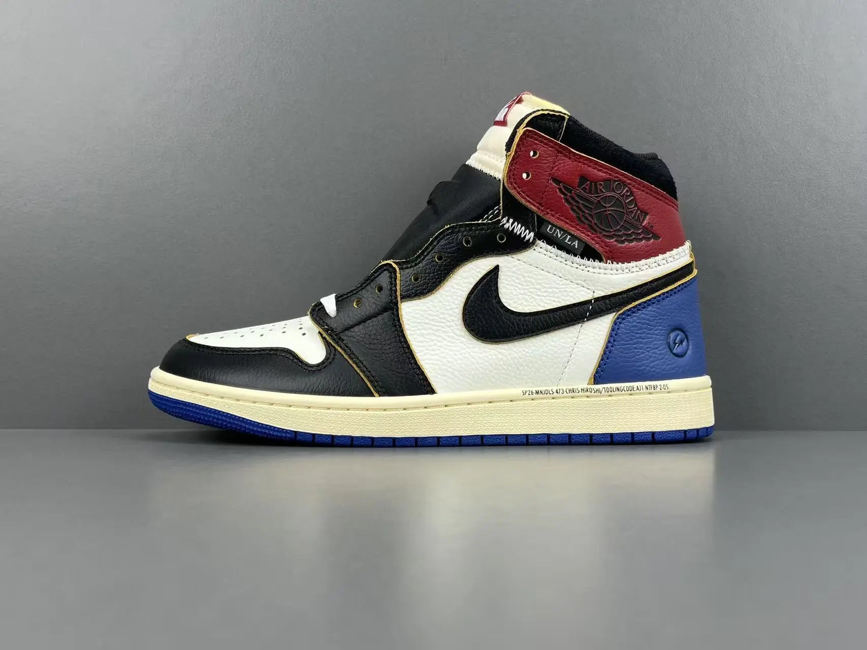 Air Jordan 1 High OG Fragment Union LA side view white navy leather sneaker