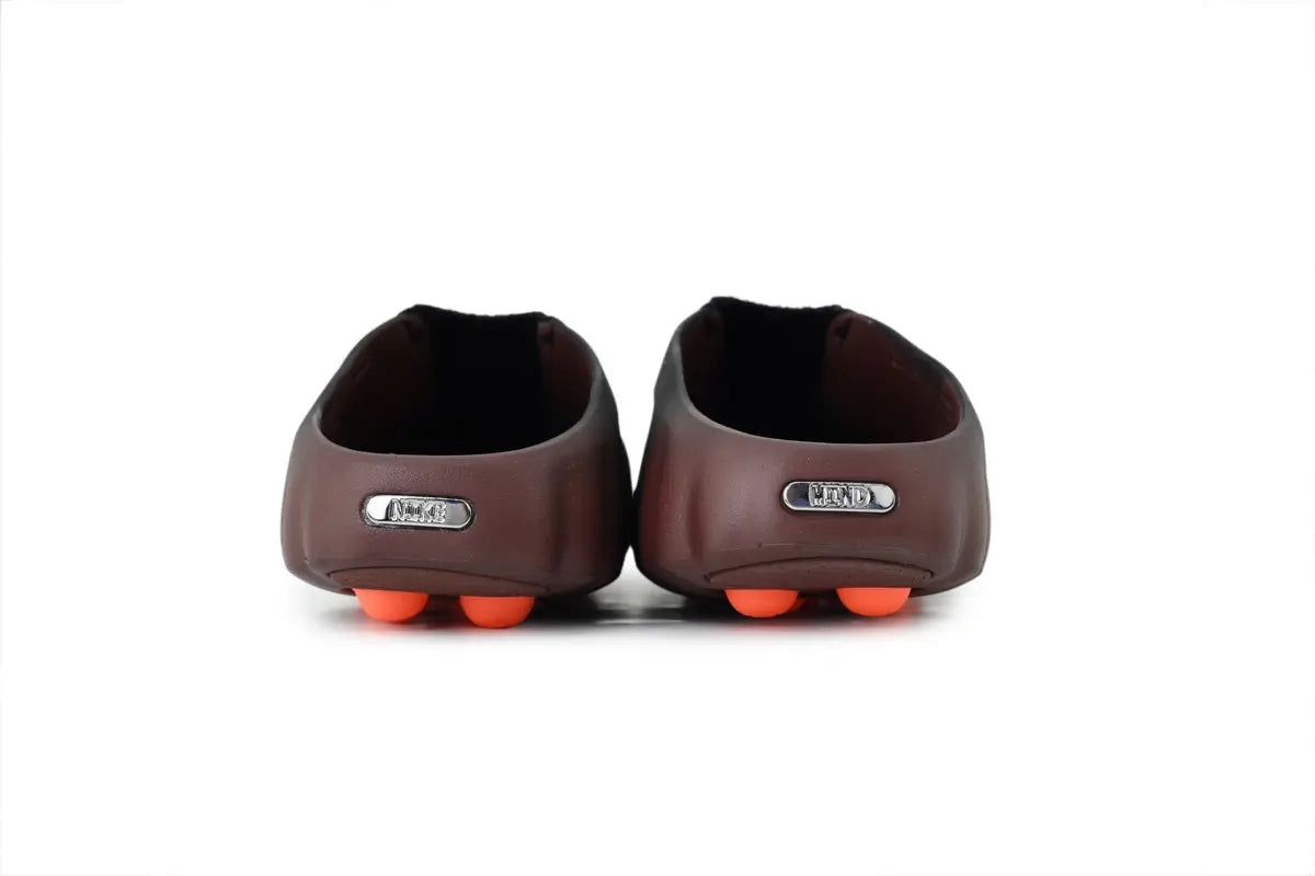 Nike Mind 001 FlyKnit Slide Bronze Eclipse Total Orange heel view Nike branding detail