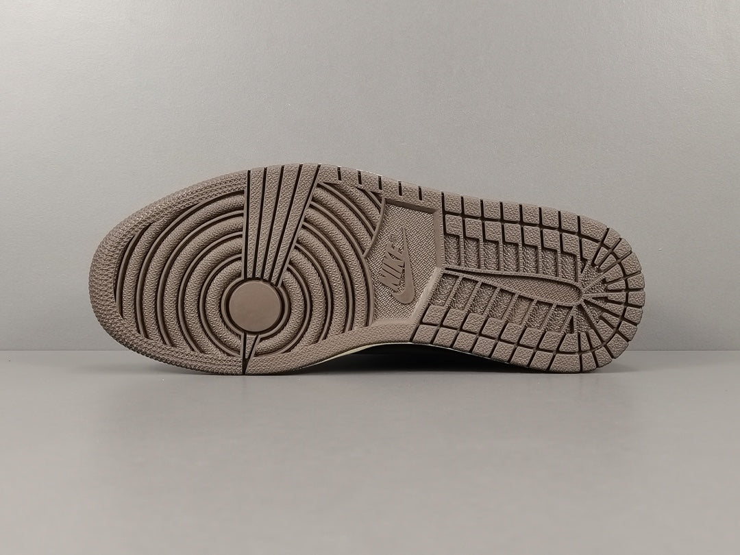 "Air Jordan 1 Low OG SP x Travis Scott sneakers featuring signature reverse Swoosh, premium materials, and Cactus Jack branding." 