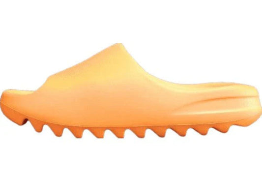 "adidas Yeezy Slide x Enflame Orange – vibrant orange slide with soft EVA foam, minimalist design, and ridged outsole for comfort and traction."