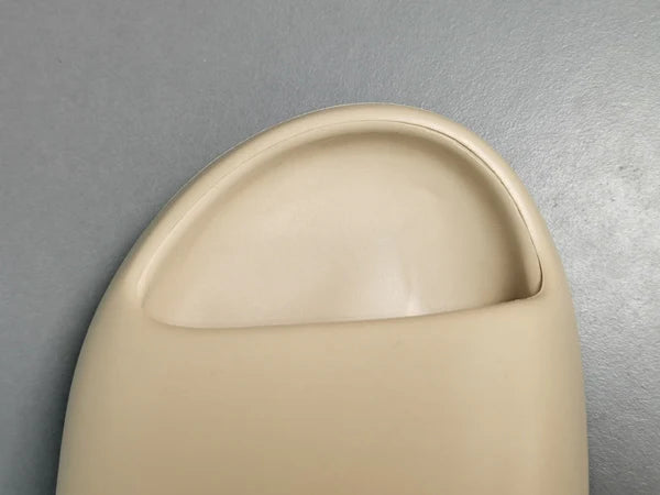 "adidas Yeezy Slide x Pure – neutral-tone slide with soft EVA foam, minimalist design, and ridged outsole for comfort and traction."