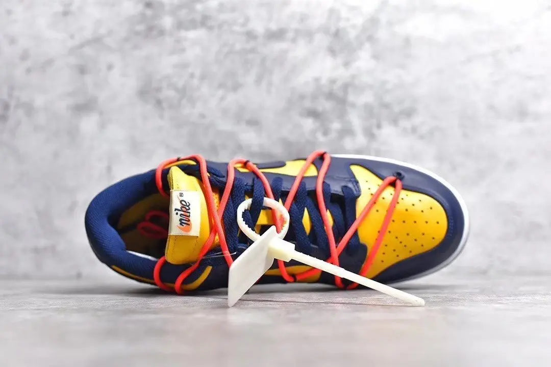 Nike Dunk Off White University Gold navy low top sneaker side view