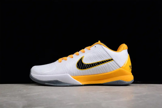 Side view of Nike Kobe 5 White Del Sol showing a clean white upper, black Swoosh and overlays, and bright Del Sol yellow detailing on the midsole and branding