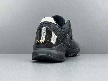 Nike Kobe 5 Blackout low-top basketball shoes in all-black stealth design colorway
