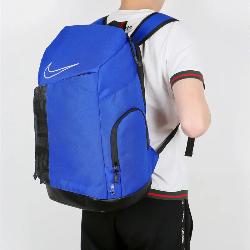 Blue and black Nike Elite Pro basketball backpack with padded straps and multiple compartments
