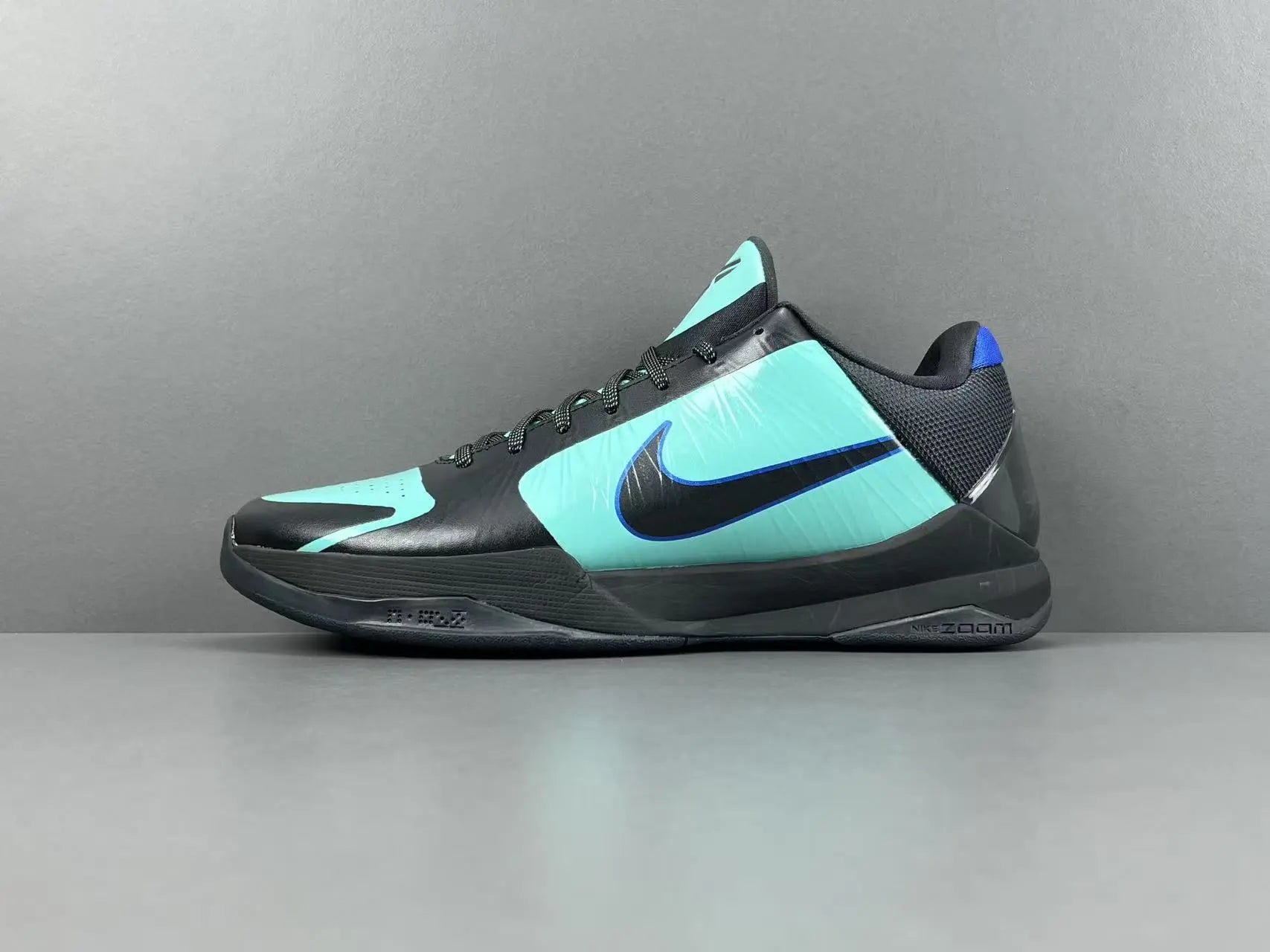 Nike Kobe 5 Protro EYBL Academy PE basketball sneakers featuring lightweight upper, forefoot Zoom Air, and elite traction