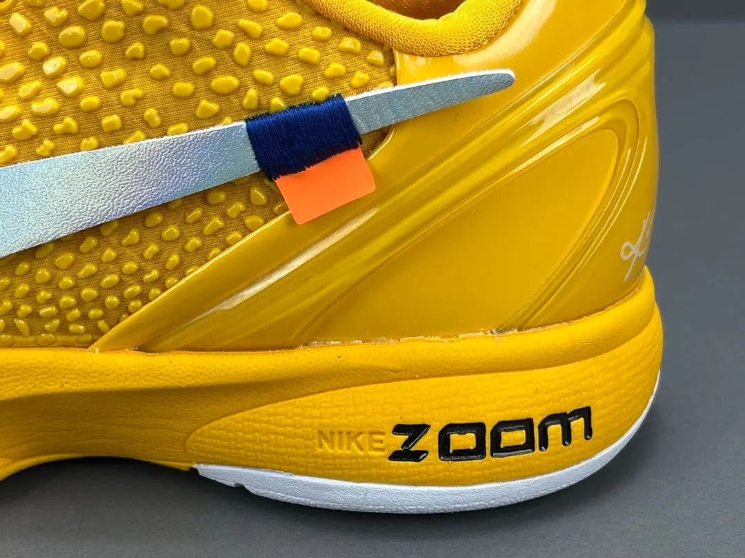 Nike Kobe 6 Protro Off-White yellow basketball shoes with bold collaborative design
