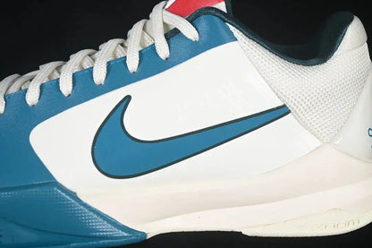 Close-up of Bright Spruce Swoosh on Nike Kobe 5 Protro Caitlin Clark Coconut Milk